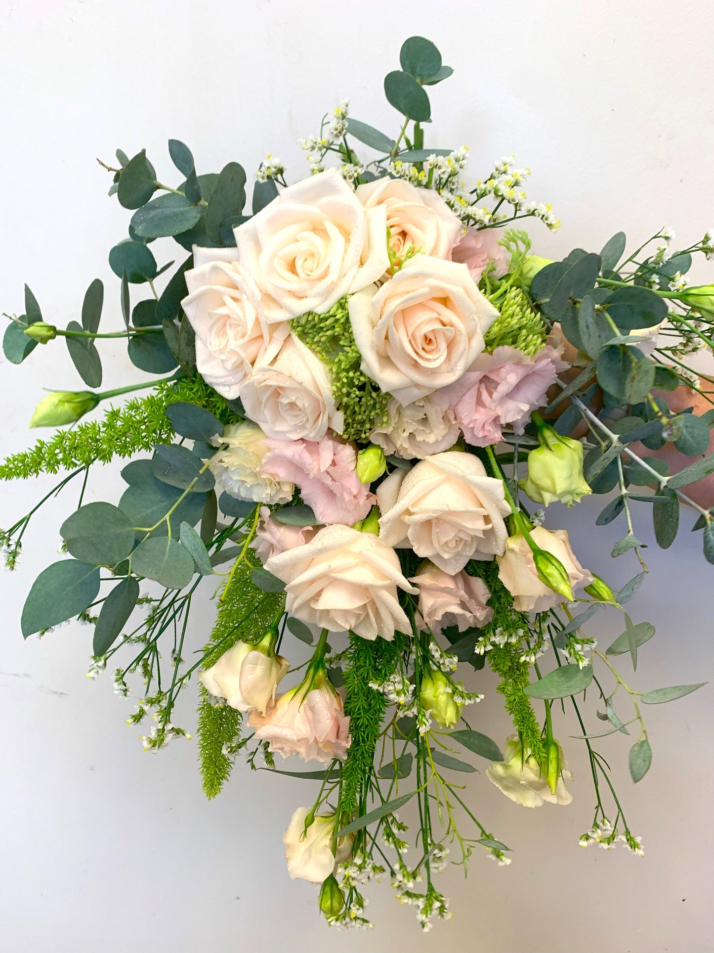 Handtied brides bouquet with Vandella Roses.