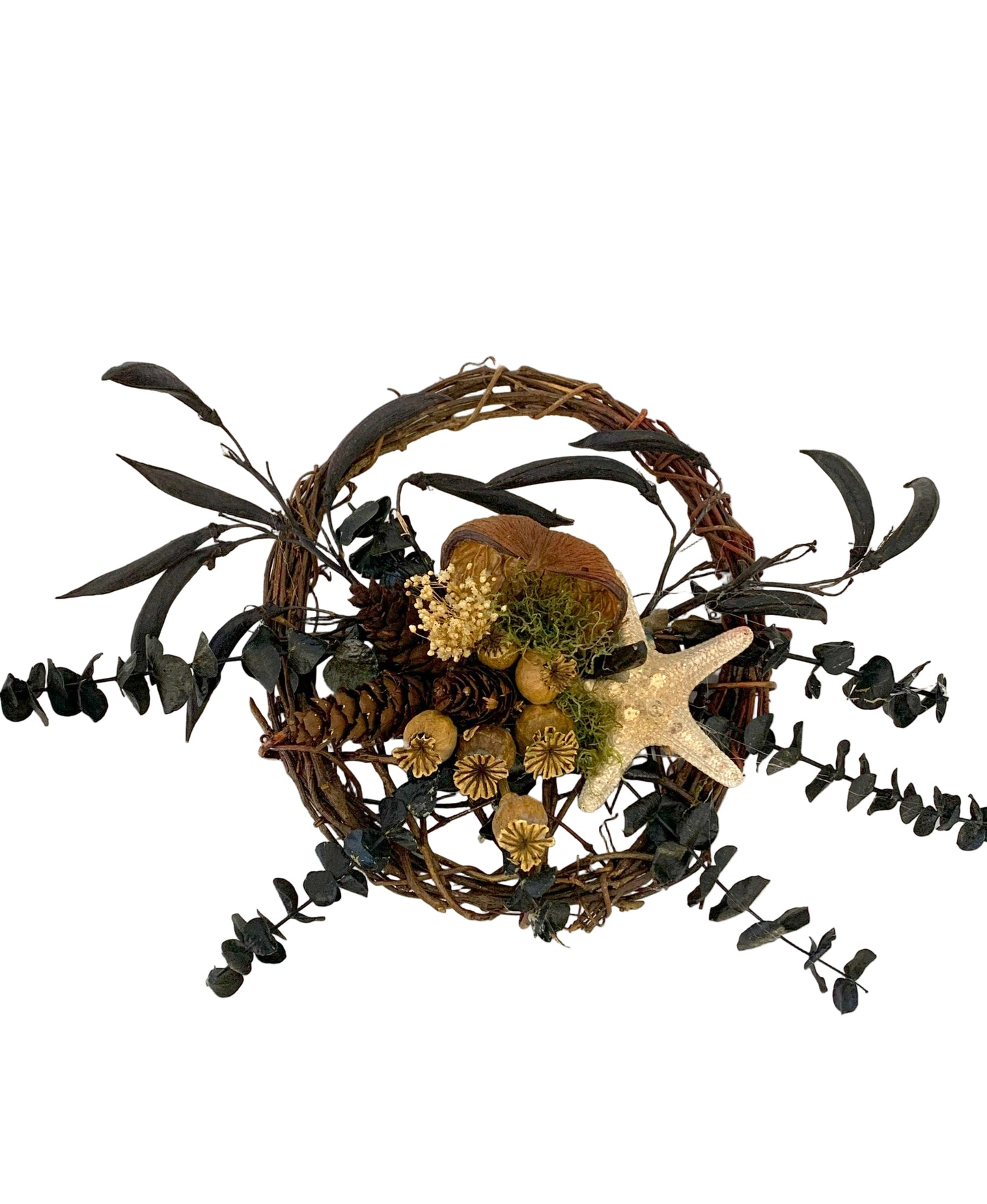 Decorative wreath with black leaves, pinecones, and a starfish on a white background