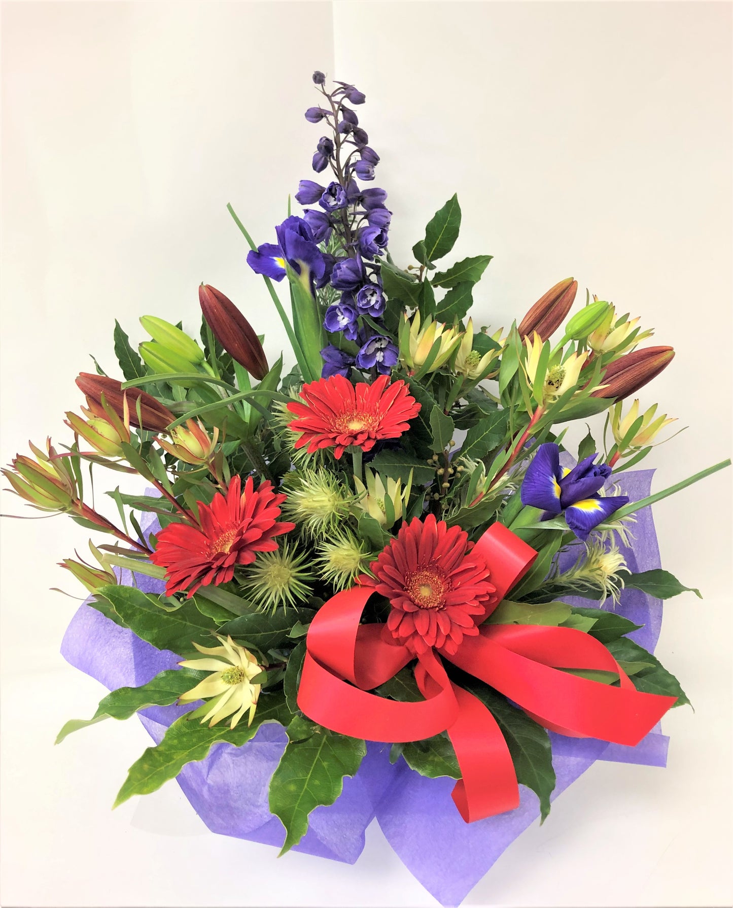 Mixed Fresh Floral Arrangement Inside A Water-box