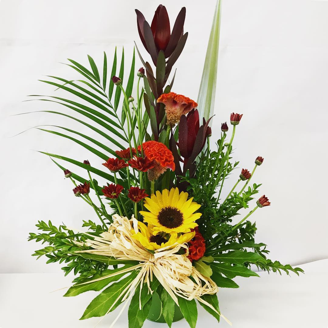 Smart Arrangement, Suitable for a modern office, Meeting room, Corporate, Flaxes, Sunflowers Arrangment.