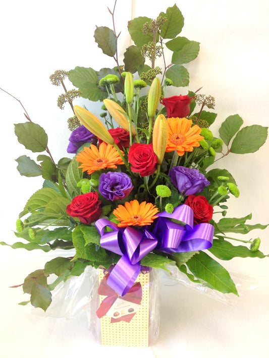 Selection of bright flowers hand tied with chocolates, get well, hospital, Retirement, Birthday, Bouquets, Anniversary, Mothers day