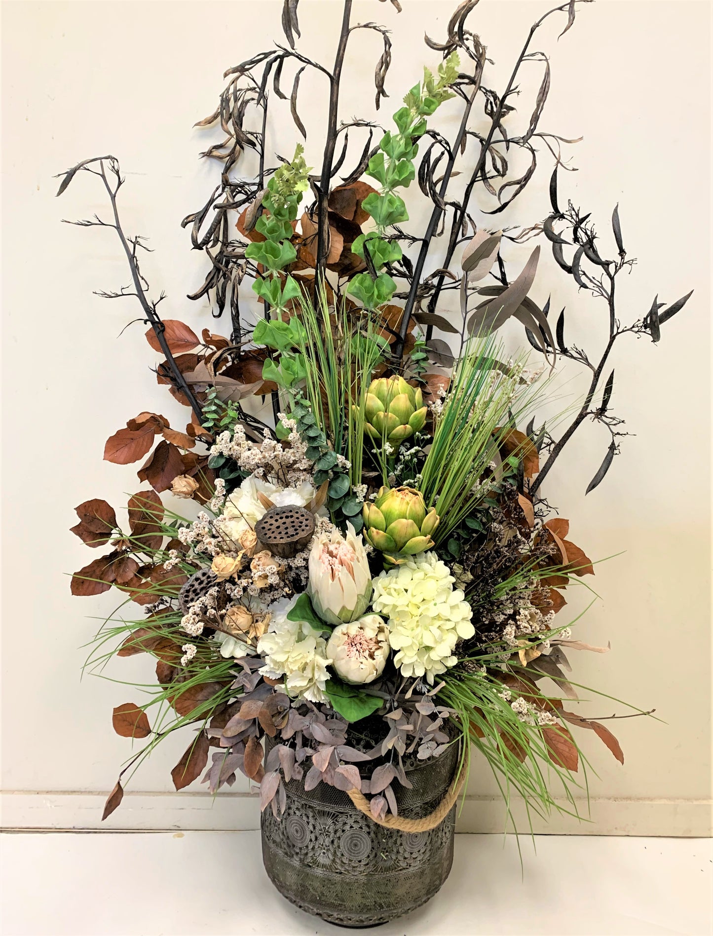 Dried Flower Arrangement Inside Historical Pot