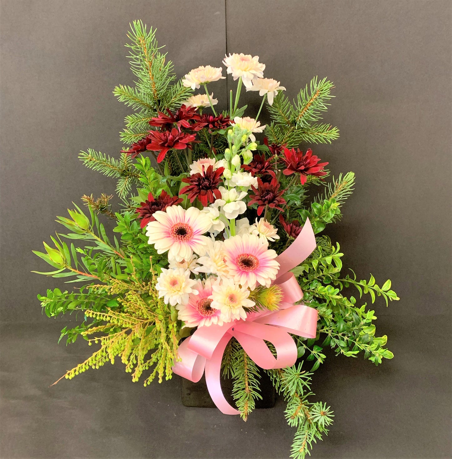 Bright Colorful Flower Arrangement In Black Pot