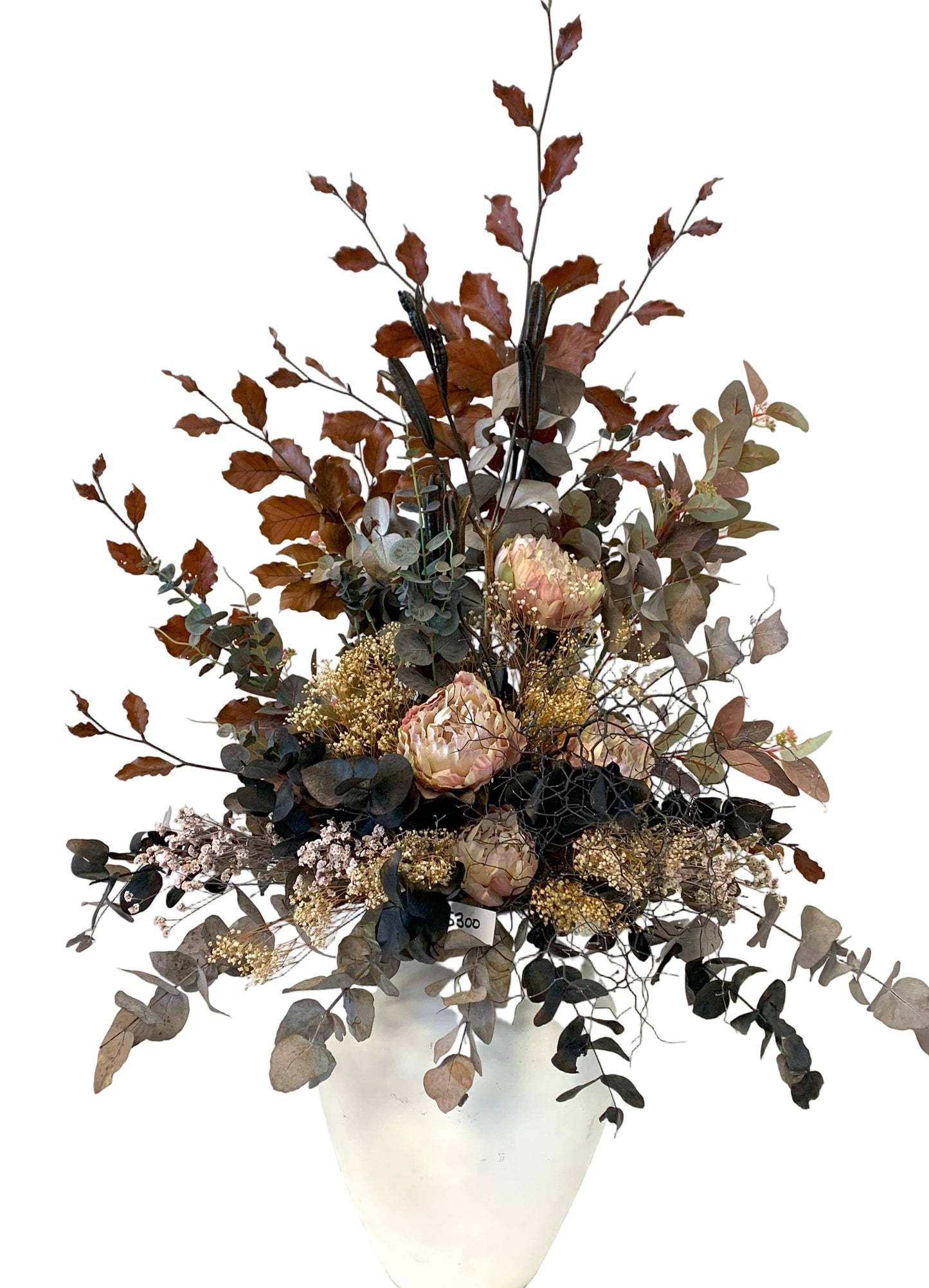 Dried arrangement in white jug