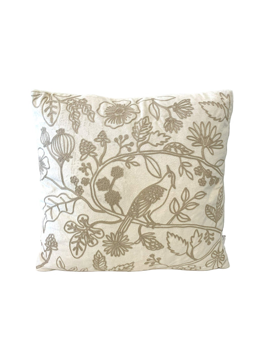 Decorative pillow with bird and floral pattern on a white background
