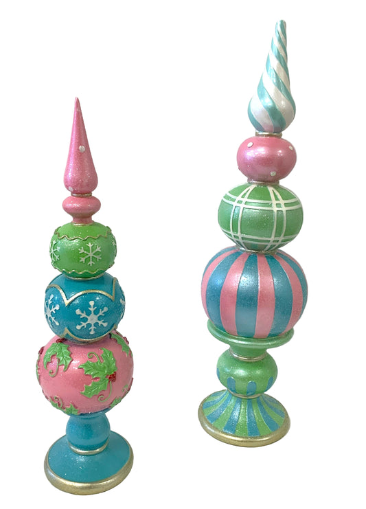 Decorative toppers with pastel colors and patterns on a white background
