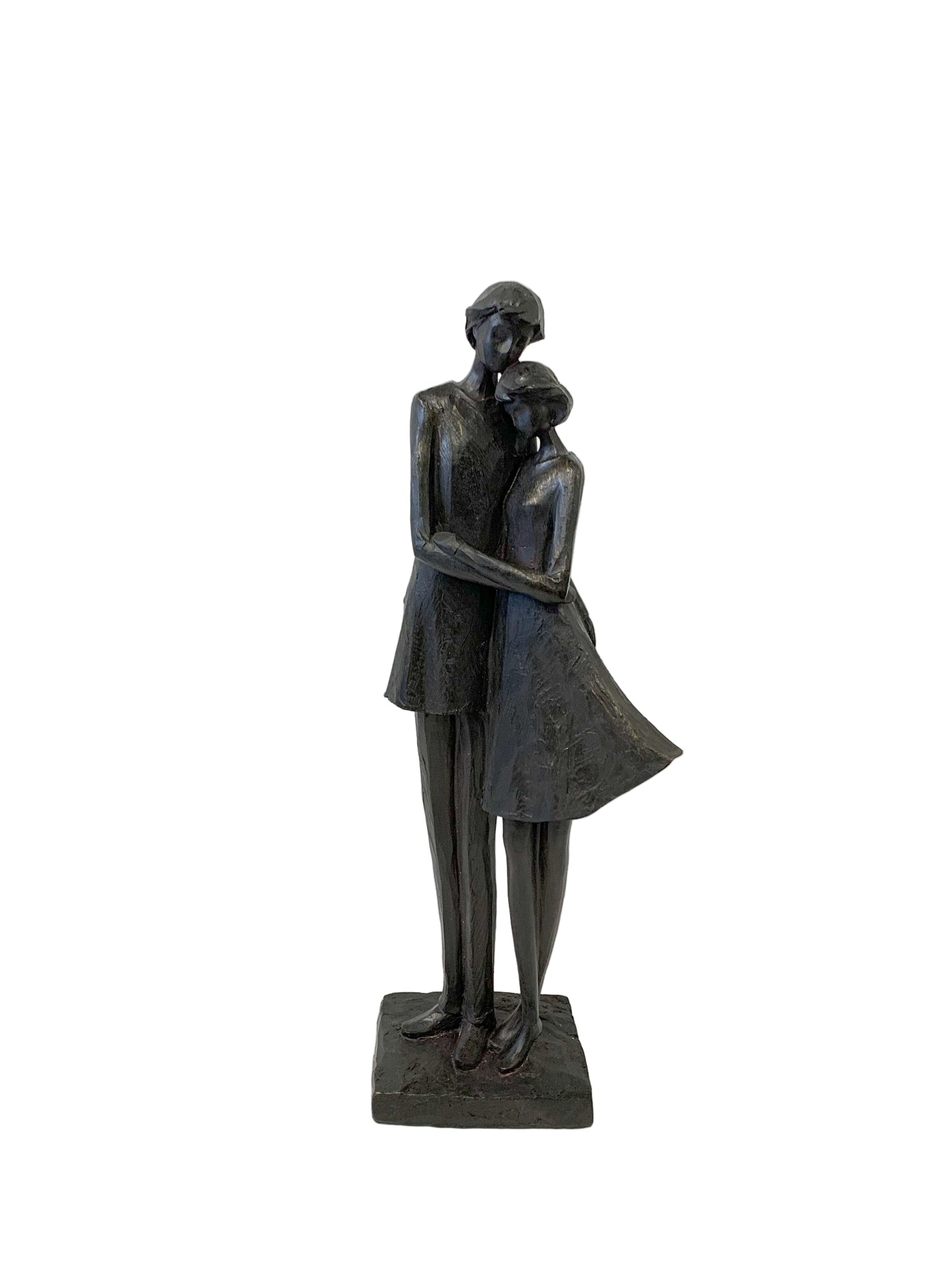 Bronze statue of a couple embracing on a white background