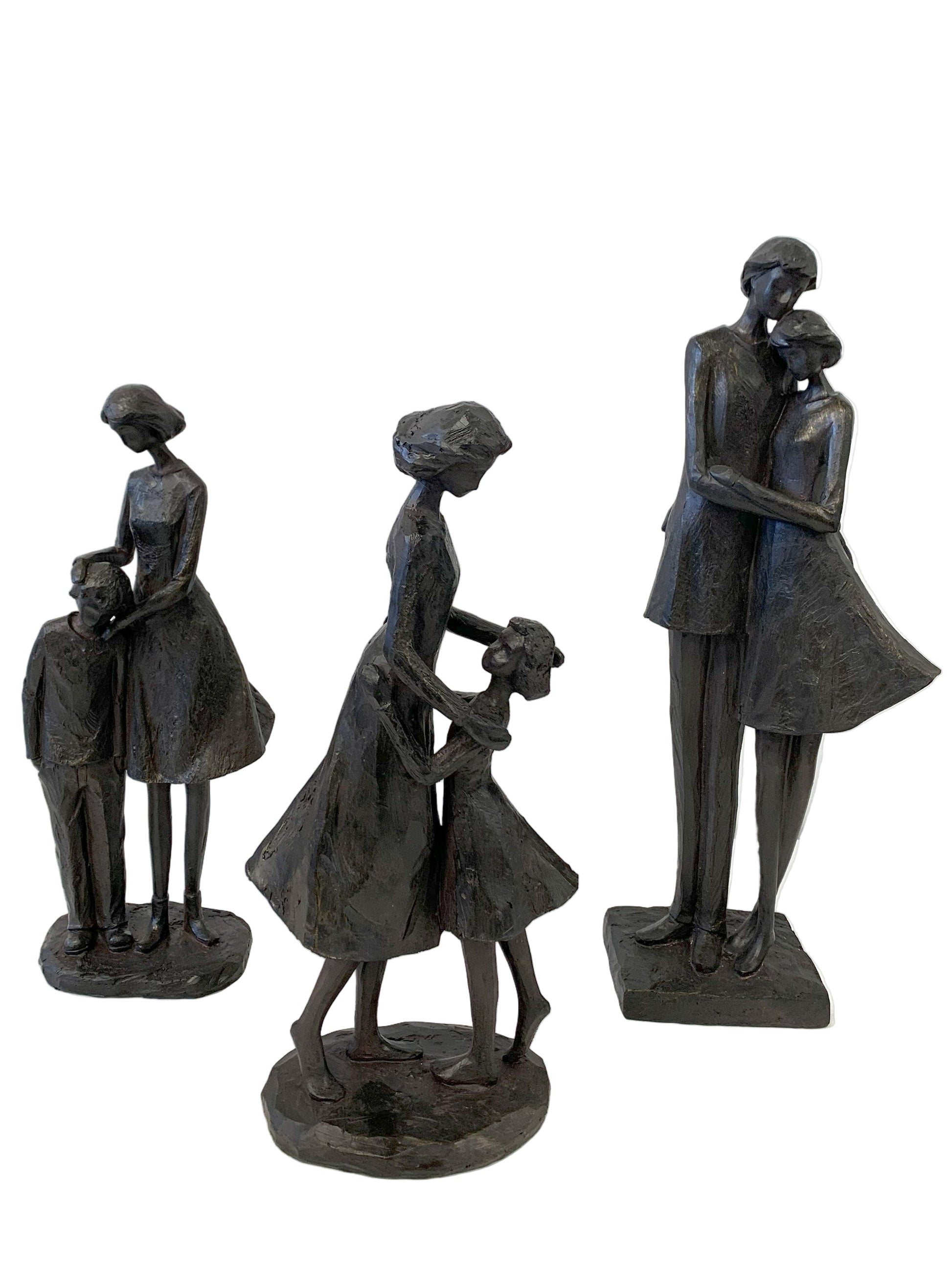 Set of three black metal sculptures of people on a white background