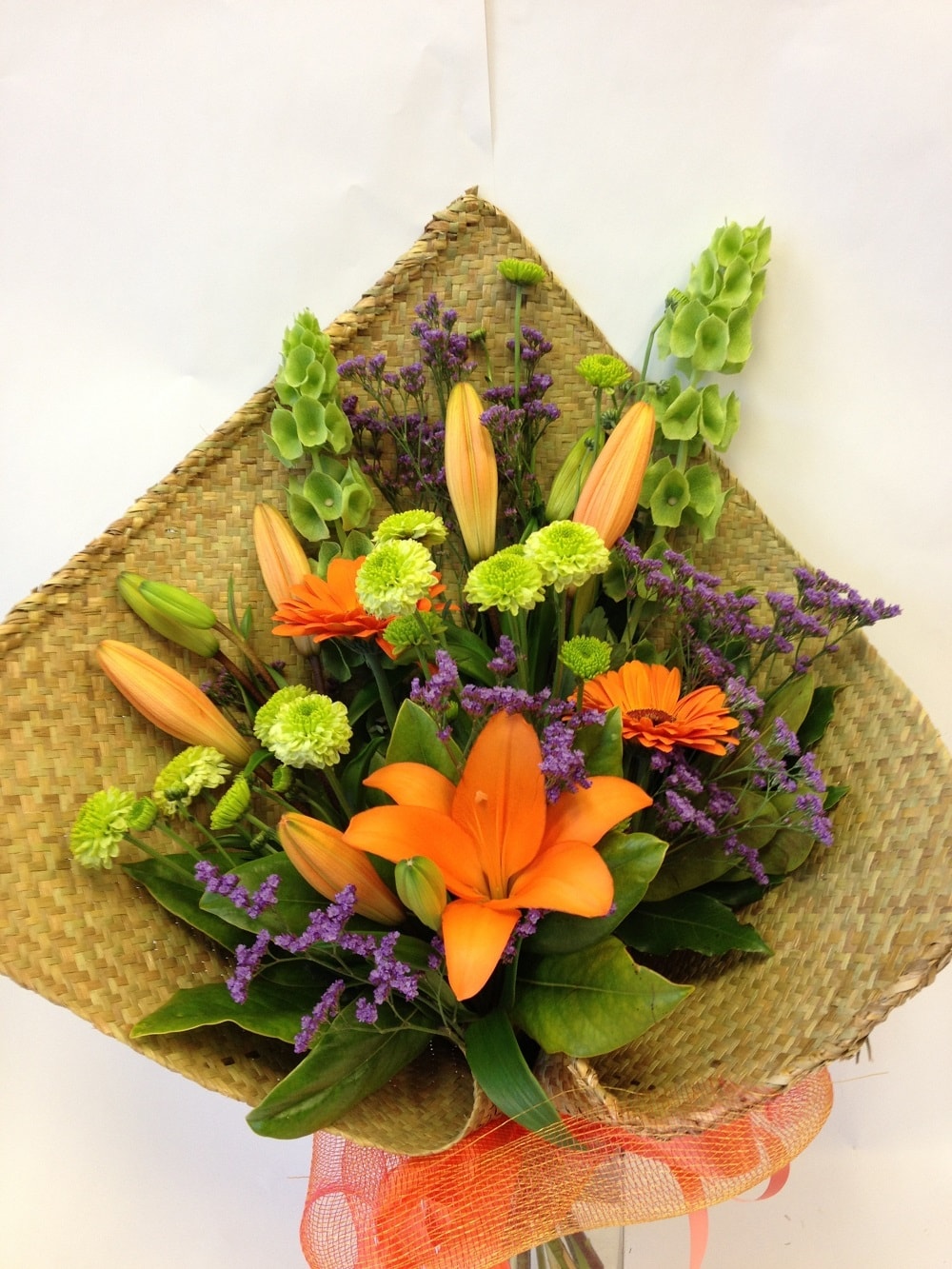 Bouquet in flax wrap, Bright woven flax, Whanau Corporate, Businesses, Birthdays
