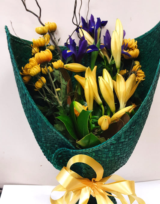 Yellow and Purple arrangement in Green Wrap