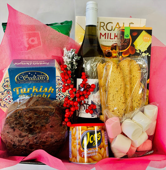 Wine, Christmas cake, chips, nuts, Turkish delight, biscotti, crackers, chocolates and Marsh mellows, Gift basket, Christmas